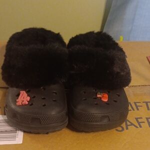 CROCS Black Fuzzy Lined Mules with Red and Orange Charms